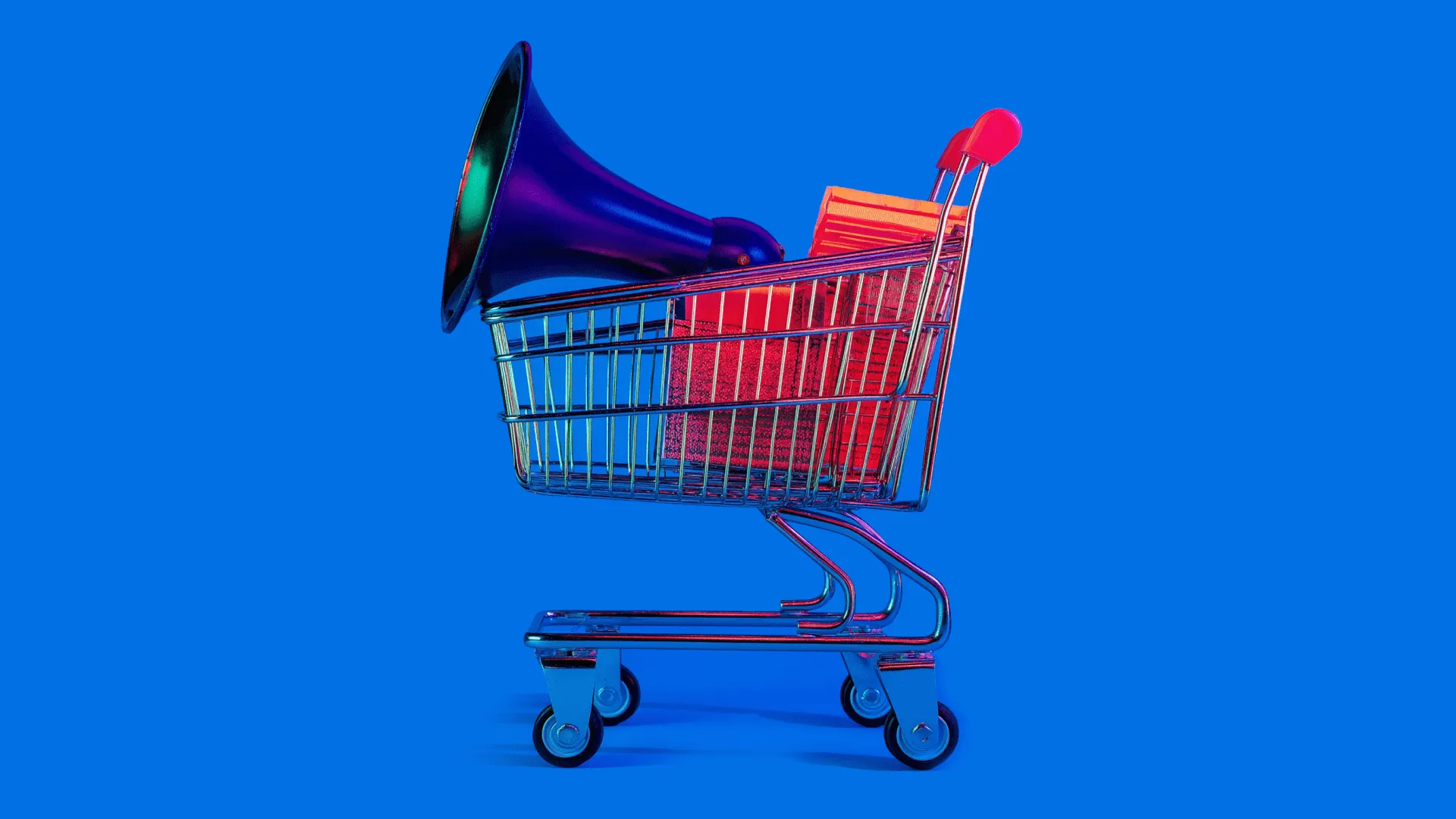 Shopping cart with a blue megaphone and orange shopping bags inside
