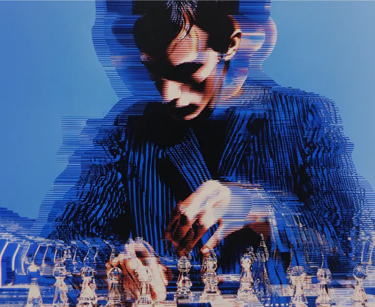 Abstract digital person playing chess