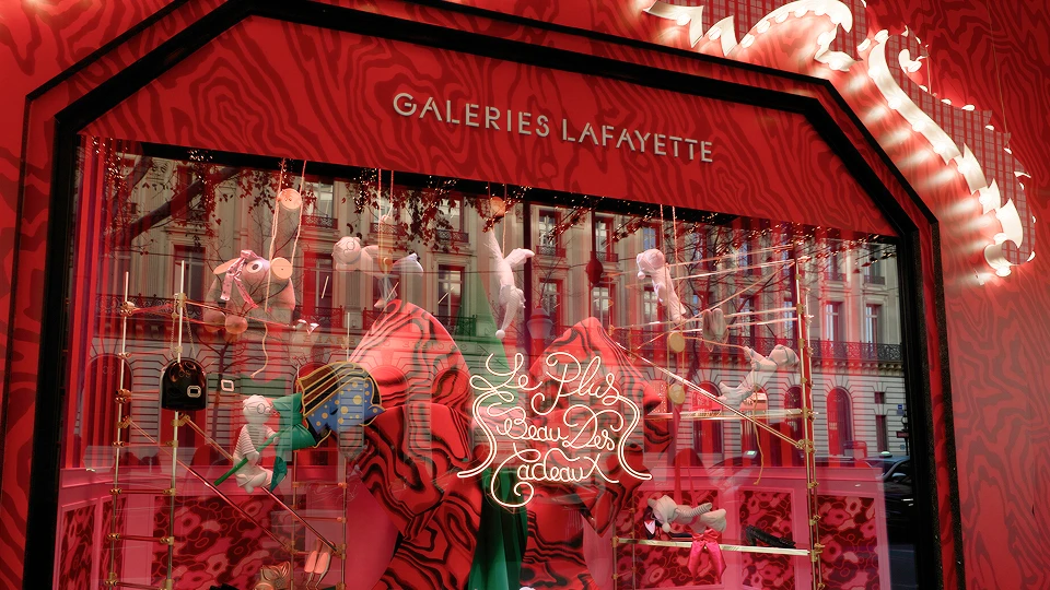 Bright Galeries Lafayette storefront on Haussmann in Paris, France